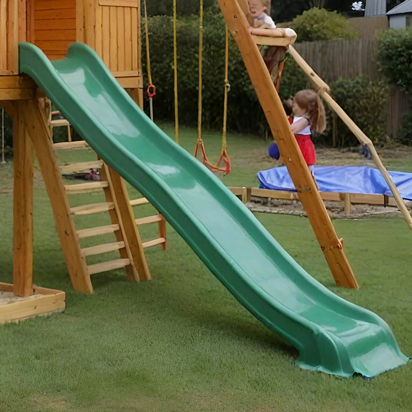 Deluxe Wooden Swing Set with Playhouse, Slides & Climbing Features